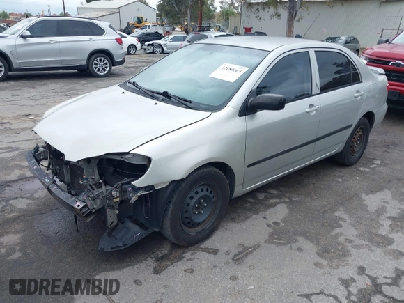 2004 Toyota Corolla CE with VIN 1NXBR32E24Z275615, listed as a IAAI auction lot 42180665 with 210,598 mi miles and . Bid and sale history available at DreamBid. Image 2.