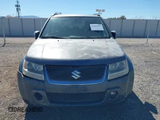 2006 Suzuki Grand Vitara Luxury z VIN JS3TE947164104381, wystawiony jako IAAI lot #41665094 z przebiegiem 145 874 mil mil oraz . Historia ofert i sprzedaży dostępna na DreamBid. Obrazek 6.