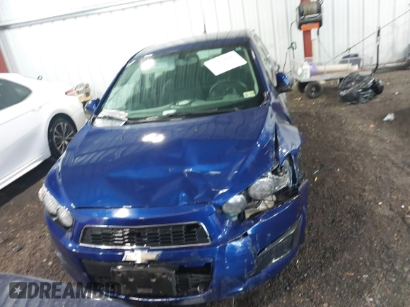 2014 Chevrolet Sonic LT with VIN 1G1JC5SG4E4136790, listed as a IAAI auction lot 37970640 with 180,252 mi miles and . Bid and sale history available at DreamBid. Image 12.