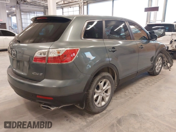 2011 Mazda CX-9 Touring with VIN JM3TB2CA2B0332314, listed as a IAAI auction lot 41077372 with 138,537 mi miles and . Bid and sale history available at DreamBid. Image 4.