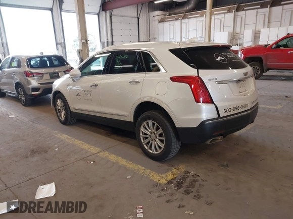 2017 Cadillac XT5 FWD with VIN 1GYKNARS7HZ121596, listed as a IAAI auction lot 41825879 with 82,023 mi miles and . Bid and sale history available at DreamBid. Image 3.
