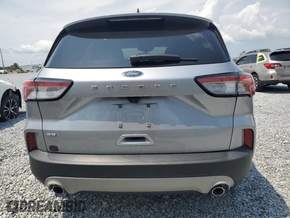 2021 Ford Escape SE z VIN 1FMCU0G64MUA91313, wystawiony jako Copart lot #56318425 z przebiegiem Nie podano mil oraz Szkoda całkowita • Salvage title. Historia ofert i sprzedaży dostępna na DreamBid. Obrazek 6.