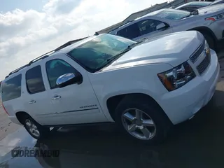 2010 Chevrolet Suburban LTZ with VIN 1GNUKKE34AR189475, listed as a IAAI auction lot 41179252 with 127,132 mi miles. Bid and sale history available at carsss.com. Image 13.