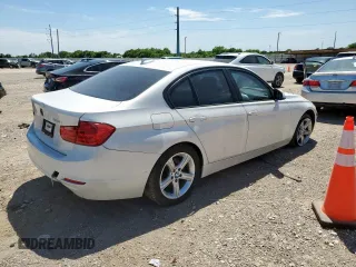 2015 BMW 3 Series 320i with VIN WBA3B1C5XFP831703, listed as a Copart auction lot 57561155 with 135,034 mi miles and Salvage title. Bid and sale history available at DreamBid. Image 3.