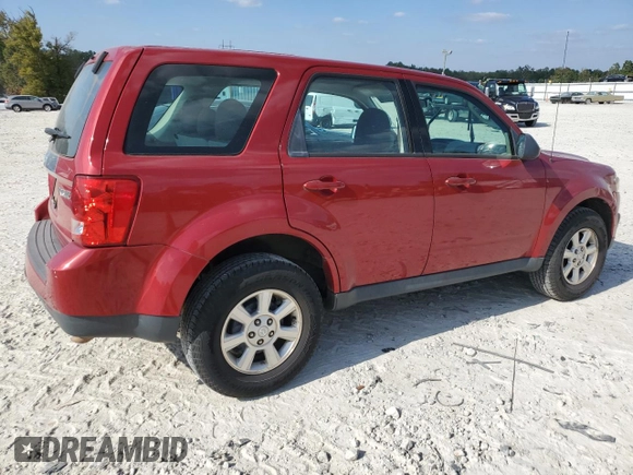 2011 Mazda Tribute Touring with VIN 4F2CY0C7XBKM00671, listed as a Copart auction lot 75431144 with 140,748 mi miles and Clean Title. Bid and sale history available at carsss.com. Image 3.
