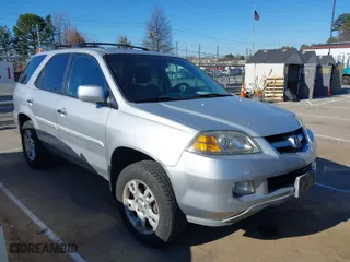 2005 Acura MDX Touring with VIN 2HNYD18655H536560, listed as a IAAI auction lot 41697056 with 145,150 mi miles. Bid and sale history available at carsss.com. Image 1.