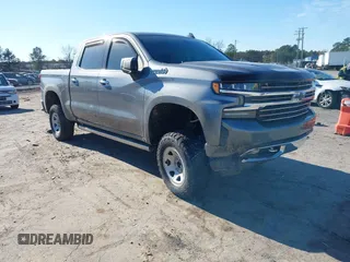 2019 Chevrolet Silverado 1500 High Country with VIN 1GCUYHEL5KZ389650, listed as a IAAI auction lot 40951587 with 60,810 mi miles. Bid and sale history available at carsss.com. Image 1.
