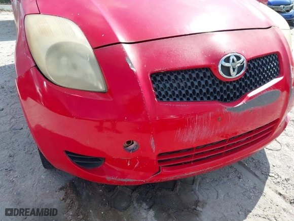 2007 Toyota Yaris with VIN JTDJT923375055871, listed as a IAAI auction lot 42038371 with 115,209 mi miles. Bid and sale history available at carsss.com. Image 6.