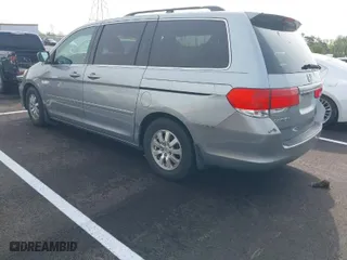 2008 Honda Odyssey EX-L with VIN 5FNRL38668B110203, listed as a IAAI auction lot 41945944 with 184,701 mi miles. Bid and sale history available at carsss.com. Image 3.