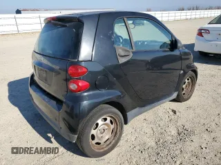 2012 Smart fortwo Pure z VIN WMEEJ3BA4CK572144, wystawiony jako Copart lot #42556025 z przebiegiem 99 007 mil mil oraz Tytuł czysty. Historia ofert i sprzedaży dostępna na DreamBid. Obrazek 3.