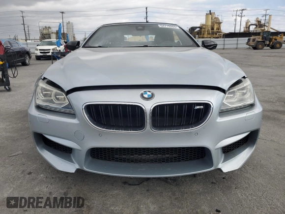2014 BMW M6 z VIN WBSLZ9C50EDZ78344, wystawiony jako Copart lot #54719265 z przebiegiem 59 556 mil mil oraz Szkoda całkowita • Salvage title. Historia ofert i sprzedaży dostępna na DreamBid. Obrazek 5.