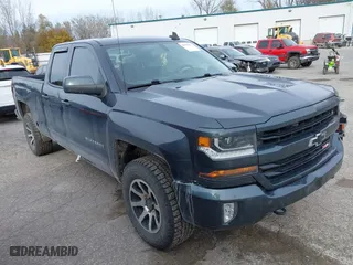 2018 Chevrolet Silverado 1500 LT with VIN 2GCVKREC2J1108231, listed as a IAAI auction lot 40839431 with 128,505 mi miles. Bid and sale history available at carsss.com. Image 1.