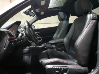 2015 BMW 2 Series 228i xDrive with VIN WBA1F7C57FVX95561, listed as a Copart auction lot 82204114 with 45,654 mi miles and Salvage Title. Bid and sale history available at carsss.com. Image 7.