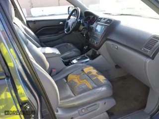 2006 Acura MDX Touring with VIN 2HNYD18726H533142, listed as a IAAI auction lot 42007839 with 216,910 mi miles. Bid and sale history available at carsss.com. Image 5.