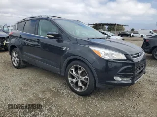 2014 Ford Escape Titanium with VIN 1FMCU9J90EUC89590, listed as a Copart auction lot 43985065 with 128,878 mi miles and Salvage Title. Bid and sale history available at carsss.com. Image 4.