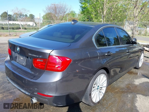 2013 BMW 3 Series ActiveHybrid 3 with VIN WBA3F9C5XDF484346, listed as a IAAI auction lot 41998341 with 145,271 mi miles. Bid and sale history available at carsss.com. Image 4.