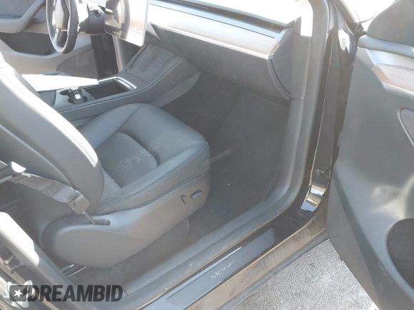 2023 Tesla Model Y Long Range with VIN 7SAYGAEE3PF925928, listed as a IAAI auction lot 41753910 with Not provided miles and . Bid and sale history available at DreamBid. Image 5.