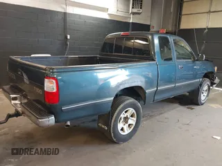 1996 Toyota T100 DX with VIN JT4UN22D2T0020138, listed as a IAAI auction lot 41912550 with 164,007 mi miles. Bid and sale history available at carsss.com. Image 4.