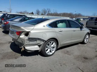 2014 Chevrolet Impala LT with VIN 2G1115SL2E9112424, listed as a Copart auction lot 49663245 with 112,140 mi miles and Salvage Title. Bid and sale history available at DreamBid. Image 3.