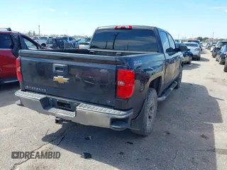 2015 Chevrolet Silverado 1500 LT with VIN 3GCUKREC2FG232302, listed as a IAAI auction lot 41652224 with 231,334 mi miles. Bid and sale history available at carsss.com. Image 4.