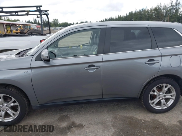 2014 Mitsubishi Outlander GT with VIN JA4JZ4AX9EZ017406, listed as a IAAI auction lot 42291696 with 107,680 mi miles and . Bid and sale history available at DreamBid. Image 15.