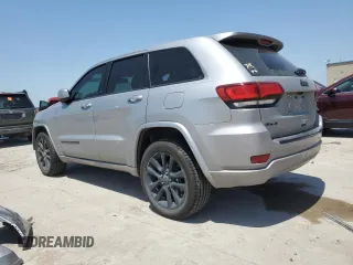 2018 Jeep Grand Cherokee Laredo with VIN 1C4RJFAG4JC272683, listed as a Copart auction lot 56823455 with 122,778 mi miles and Salvage title. Bid and sale history available at DreamBid. Image 2.