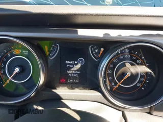 2023 Jeep Wrangler Willys with VIN 1C4HJXDN0PW597768, listed as a IAAI auction lot 41645815 with 23,717 mi miles and . Bid and sale history available at DreamBid. Image 7.
