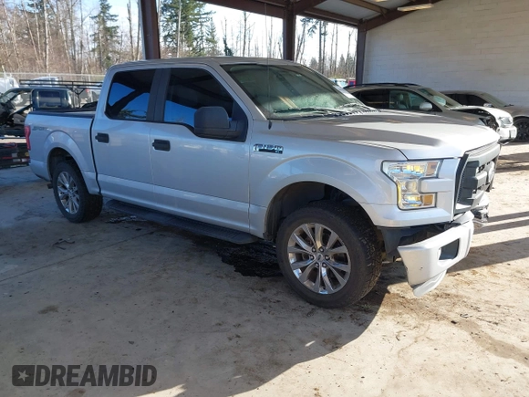 2015 Ford F-150 XLT with VIN 1FTEW1C86FKE85267, listed as a IAAI auction lot 41527996 with 119,800 mi miles and . Bid and sale history available at carsss.com. Image 1.