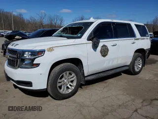 2019 Chevrolet Tahoe Commercial with VIN 1GNSKFEC9KR292245, listed as a Copart auction lot 52427415 with 58,555 mi miles and Salvage title. Bid and sale history available at DreamBid. Image 1.