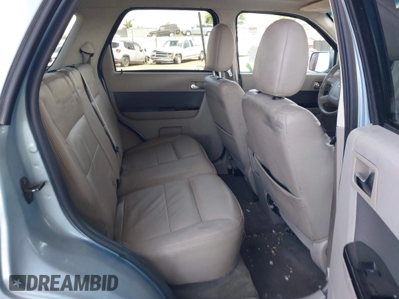 2009 Ford Escape Hybrid z VIN 1FMCU49359KA28475, wystawiony jako IAAI lot #42153444 z przebiegiem 210 067 mil mil oraz . Historia ofert i sprzedaży dostępna na DreamBid. Obrazek 8.