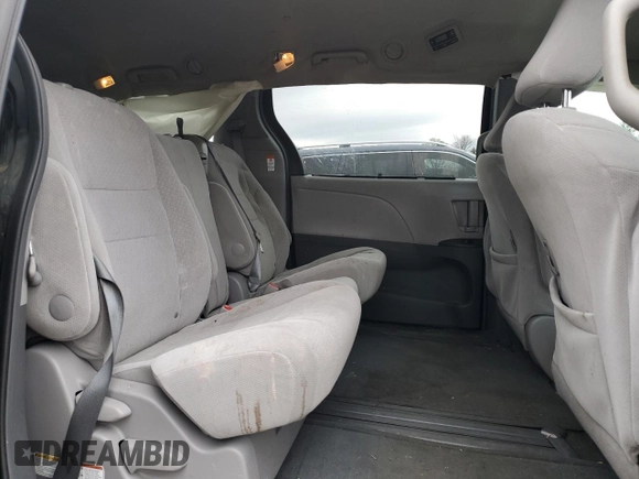 2015 Toyota Sienna LE AAS with VIN 5TDKK3DC5FS550597, listed as a Copart auction lot 51458215 with 74,090 mi miles and Salvage Title. Bid and sale history available at DreamBid. Image 11.