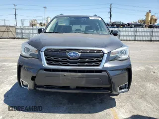 2017 Subaru Forester Touring with VIN JF2SJGWC1HH476823, listed as a Copart auction lot 59230835 with 107,711 mi miles and Salvage title. Bid and sale history available at DreamBid. Image 5.