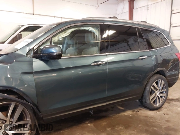 2016 Honda Pilot Elite with VIN 5FNYF6H09GB085621, listed as a IAAI auction lot 41788911 with 137,199 mi miles. Bid and sale history available at carsss.com. Image 15.