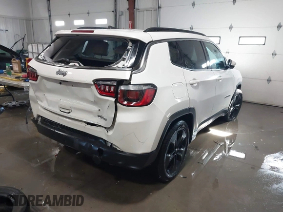 2019 Jeep Compass Latitude with VIN 3C4NJCBB2KT843724, listed as a IAAI auction lot 41366778 with 136,236 mi miles and . Bid and sale history available at DreamBid. Image 4.