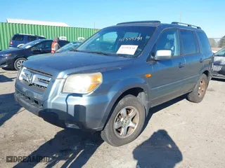 2006 Honda Pilot EX-L with VIN 5FNYF18516B002860, listed as a IAAI auction lot 41355134 with 202,797 mi miles. Bid and sale history available at carsss.com. Image 2.