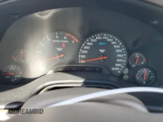 2004 Chevrolet Corvette with VIN 1G1YY22G145132963, listed as a Copart auction lot 74264184 with 74,077 mi miles and Salvage Title. Bid and sale history available at carsss.com. Image 9.