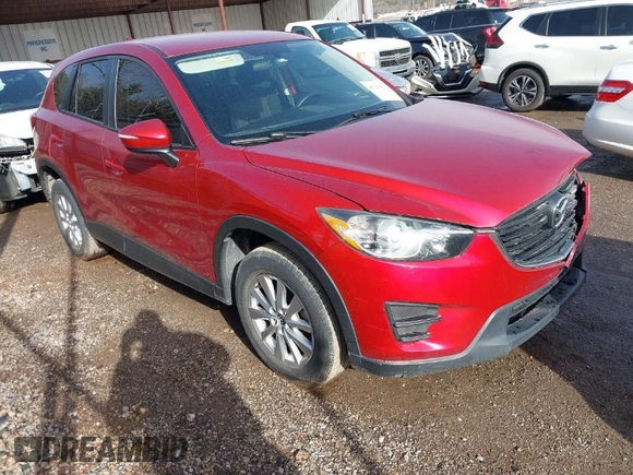 2016 Mazda CX-5 Sport with VIN JM3KE2BY3G0754391, listed as a IAAI auction lot 41719461 with 79,130 mi miles. Bid and sale history available at carsss.com. Image 1.