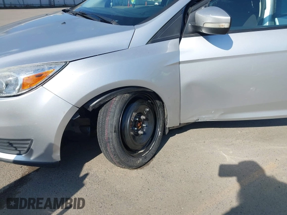 2016 Ford Focus SE with VIN 1FADP3F24GL230601, listed as a IAAI auction lot 41988130 with 176,366 mi miles. Bid and sale history available at carsss.com. Image 6.