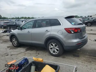 2014 Mazda CX-9 Touring с VIN JM3TB2CA2E0431879, выставлен на аукционе Copart как лот 64778845 с пробегом 145 476 миль миль и Чистый • Clean title. История ставок и продаж доступна на DreamBid. Изображение 2.