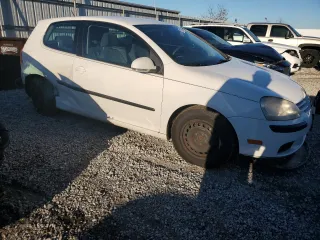 2009 Volkswagen Rabbit S with VIN WVWBB71KX9W002800, listed as a Copart auction lot 79734584 with 120,177 mi miles and Salvage Title. Bid and sale history available at carsss.com. Image 4.
