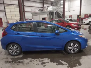 2016 Honda Fit EX z VIN JHMGK5H76GX041661, wystawiony jako IAAI lot #42162223 z przebiegiem 36 066 mil mil oraz . Historia ofert i sprzedaży dostępna na DreamBid. Obrazek 13.