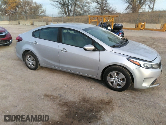2018 Kia Forte LX with VIN 3KPFK4A79JE210080, listed as a IAAI auction lot 40681931 with 124,986 mi miles and . Bid and sale history available at DreamBid. Image 1.