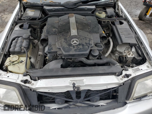1999 Mercedes-Benz SL 500 with VIN WDBFA68F1XF177603, listed as a Copart auction lot 58983485 with 120,737 mi miles and Salvage title. Bid and sale history available at DreamBid. Image 11.