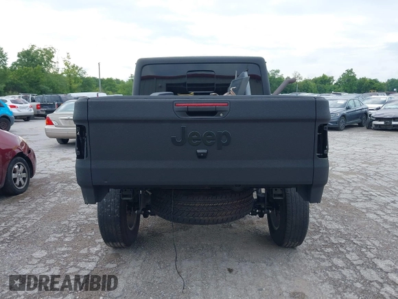 2021 Jeep Gladiator Sport S z VIN 1C6JJTAG9ML604950, wystawiony jako IAAI lot #39912720 z przebiegiem 34 640 mil mil oraz . Historia ofert i sprzedaży dostępna na DreamBid. Obrazek 16.