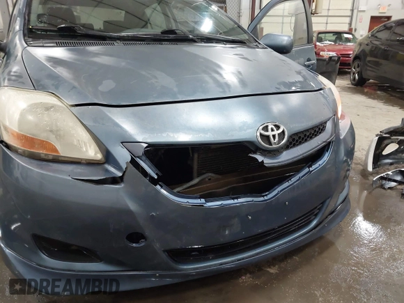 2007 Toyota Yaris with VIN JTDBT903371175510, listed as a IAAI auction lot 41573587 with 218,210 mi miles. Bid and sale history available at carsss.com. Image 6.