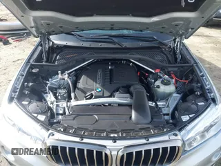 2019 BMW X6 xDrive35i with VIN 5UXKU2C52K0Z63984, listed as a IAAI auction lot 41612265 with 65,634 mi miles. Bid and sale history available at carsss.com. Image 10.