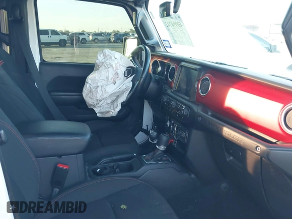2022 Jeep Wrangler Unlimited Rubicon with VIN 1C4HJXFN4NW123803, listed as a IAAI auction lot 40994742 with 36,156 mi miles and . Bid and sale history available at DreamBid. Image 5.