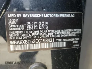 2012 BMW 7 Series with VIN WBAKX8C52CC198431, listed as a Copart auction lot 75295664 with 72,818 mi miles and Clean title. Bid and sale history available at DreamBid. Image 12.