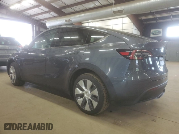 2023 Tesla Model Y Long Range z VIN 7SAYGDEE6PA179733, wystawiony jako Copart lot #58399015 z przebiegiem 45 780 mil mil oraz Szkoda całkowita • Salvage title. Historia ofert i sprzedaży dostępna na DreamBid. Obrazek 2.