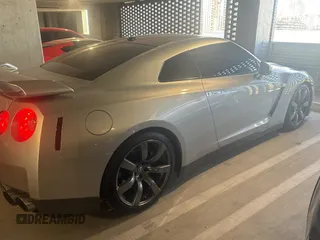 2009 Nissan GT-R Premium z VIN JN1AR54F89M252013, wystawiony jako Copart lot #82469654 z przebiegiem 66 337 mil mil oraz Szkoda całkowita • Salvage title. Historia ofert i sprzedaży dostępna na DreamBid. Obrazek 4.
